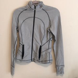 Grey herringbone zip up with ruffle back